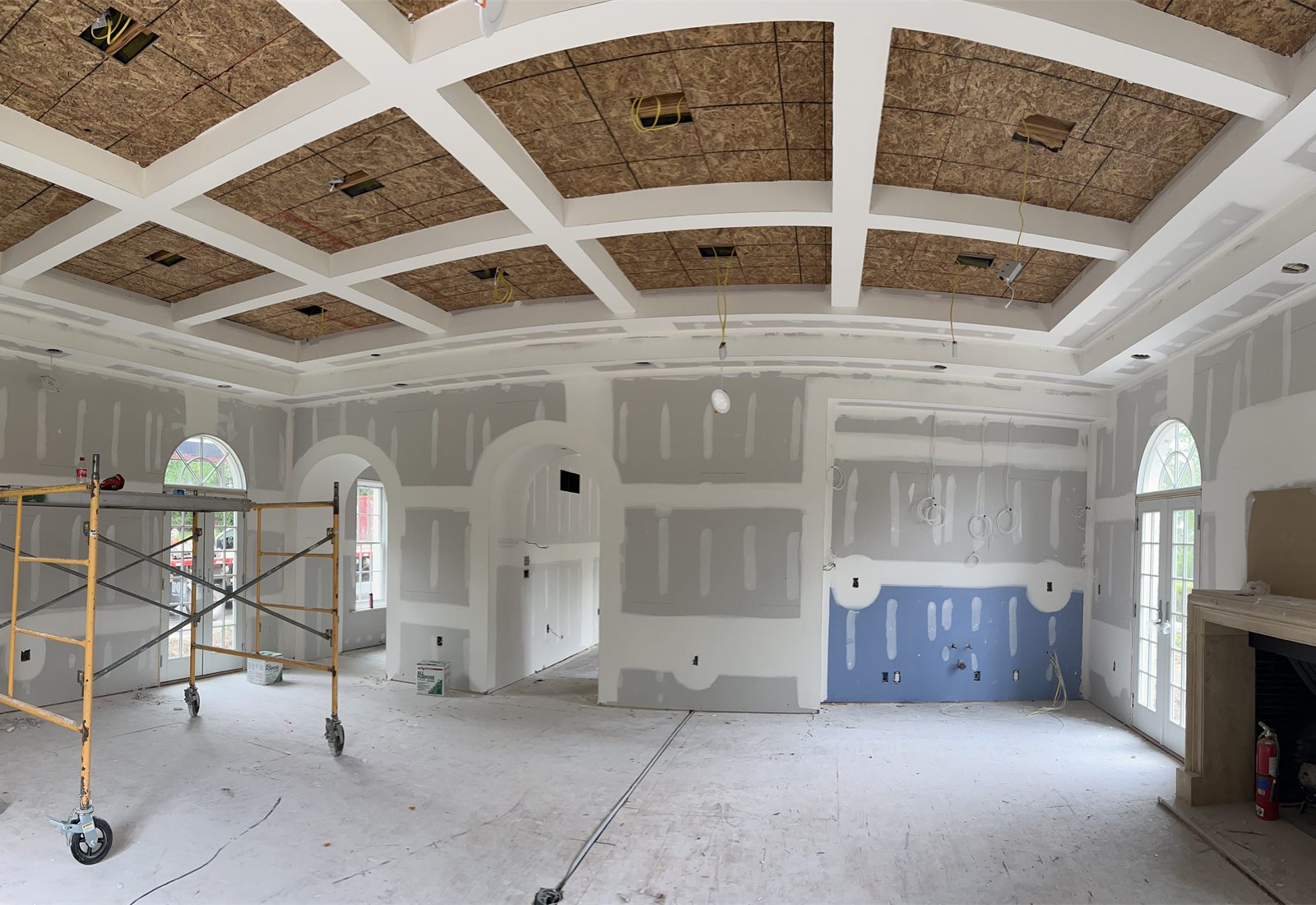 Large interior renovation with finished drywall and custom ceiling detail